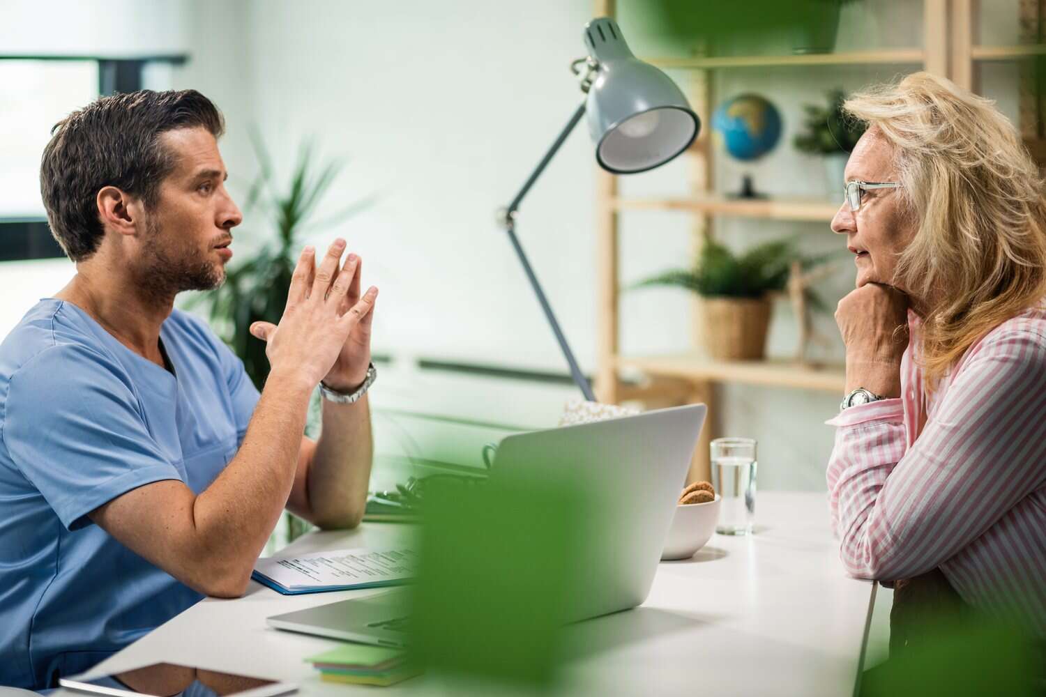 Doctor talking with a patient